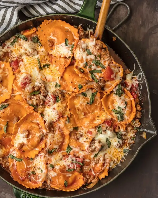 One-pan dinner with roasted chicken and vegetables on a sheet pan