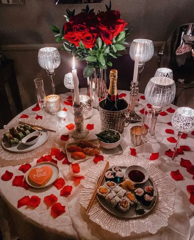 Romantic birthday dinner for two at home with candles and wine