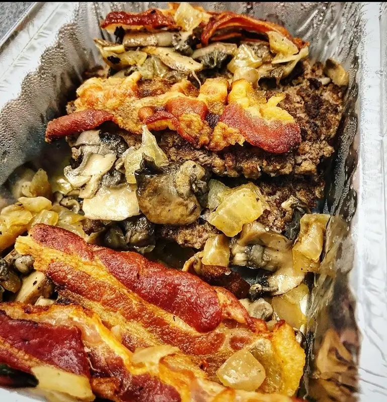 Smash burger bowl ingredients including ground beef, cheese, pickles, and burger sauce